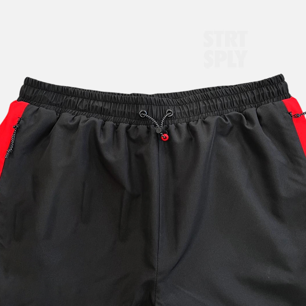 Syna World Vortex Woven Shorts - Black / Red
