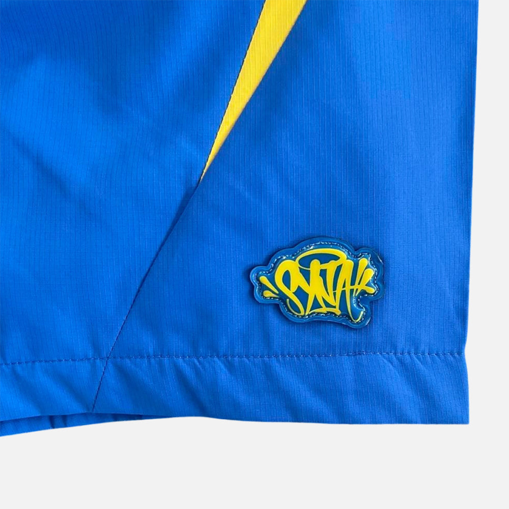 Syna World Vortex Woven Shorts - Blue / Yellow